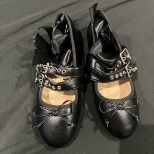 Black ballet flats with ribbon tie up